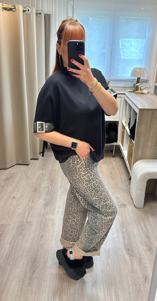 Pull noir détails boucles