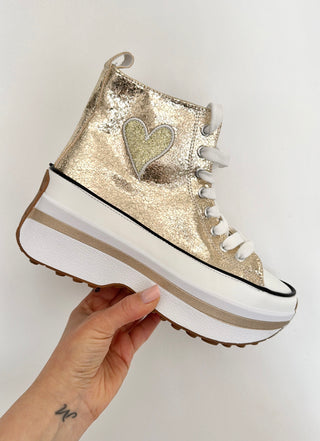 Converse dorées à plateforme