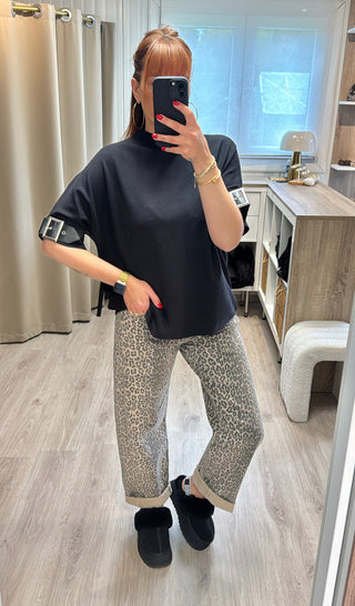 Pull noir détails boucles