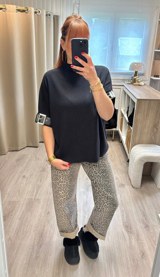 Pull noir détails boucles